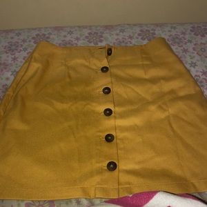 yellow buttoned skirt